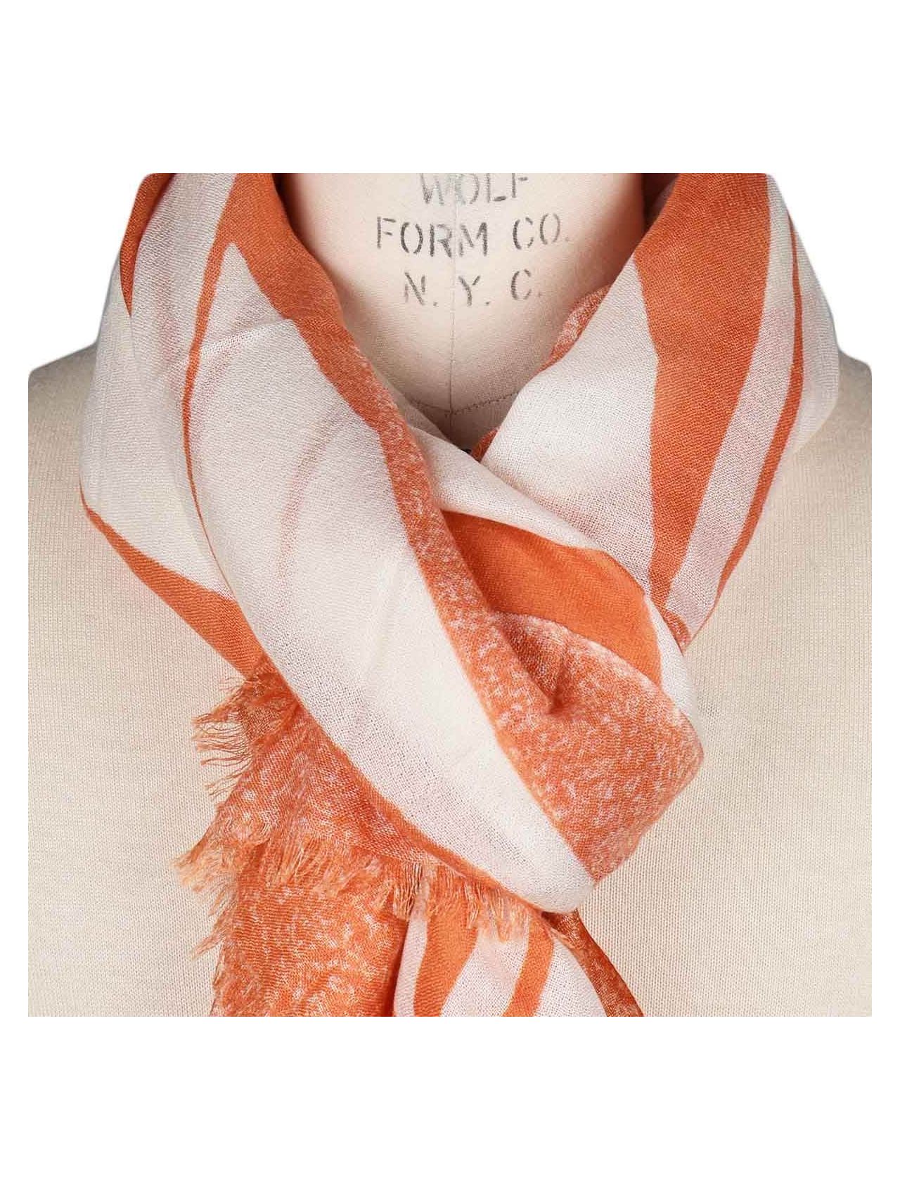 Orange and store white scarf